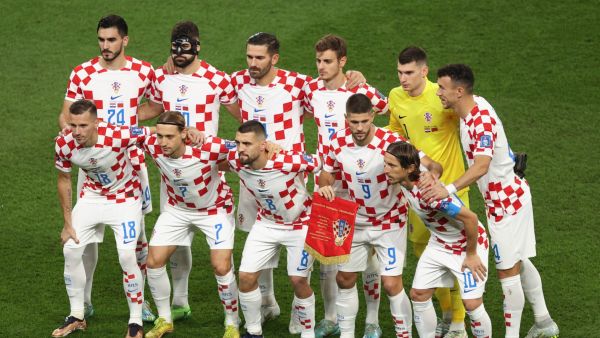 Croatia's starting XI pose prior to the Qatar 2022 World Cup football third place play-off match between Croatia and Morocco at Khalifa International Stadium in Doha on December 17, 2022. (Photo by ADRIAN DENNIS / AFP)