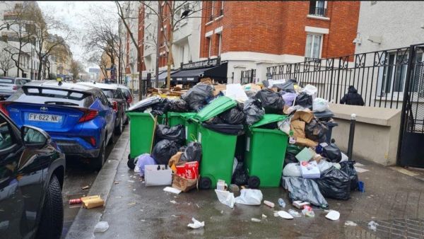 Garbage filled one of the streets in France amid workers' strikes. (Twitter/ @OTsyndrom) The new pension reform plan acknowledges raising the retirement age from 62 to 64 triggering angry protests.