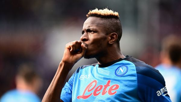 Napoli's Nigerian forward Victor Osimhen celebrates after scoring his side's third goal during the Italian Serie A football match between Torino and Napoli on March 19, 2023 at the Olympic stadium in Turin. (Photo by Marco BERTORELLO / AFP)