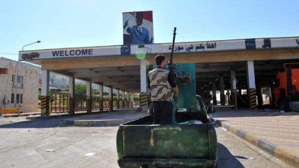 Syrians claim Turkish border forces beat them