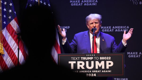 Former President Donald Trump speaks at the Adler Theatre on March 13, 2023 in Davenport, Iowa. Scott Olson/Getty Images/AFP Donald Trump