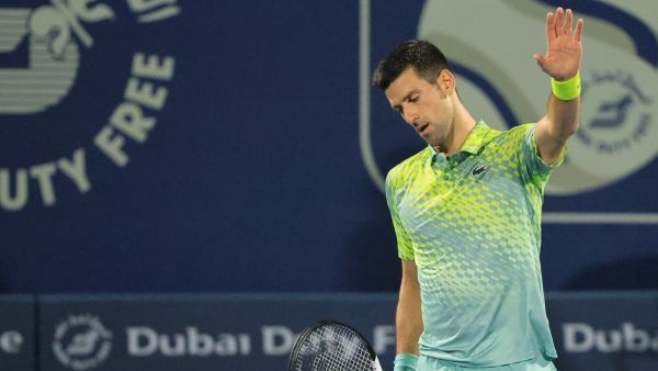 Serbia's Novak Djokovic reacts during his match with Russia's Daniil Medvedev (not pictured) at the ATP Dubai Duty Free Tennis Championship semi-final match in Dubai, on March 3, 2023. (Photo by Karim SAHIB / AFP)