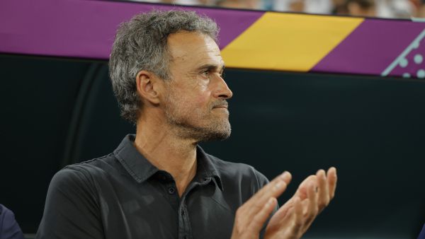 Spain's coach #00 Luis Enrique applauds ahead of the start of the Qatar 2022 World Cup round of 16 football match between Morocco and Spain at the Education City Stadium in Al-Rayyan, west of Doha on December 6, 2022. (Photo by Odd ANDERSEN / AFP)