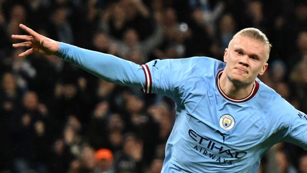 Manchester City's Norwegian striker Erling Haaland celebrates after scoring the opening goal in the English FA Cup quarter-final football match between Manchester City and Burnley at the Etihad Stadium in Manchester, north-west England, on March 18, 2023. (Photo by Oli SCARFF / AFP) 