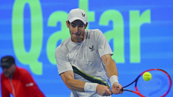 Britain's Andy Murray hits a return against Russia's Daniil Medvedev (unseen) during their Qatar Open final tennis match in Doha, on February 25, 2023. (Photo by KARIM JAAFAR / AFP)
