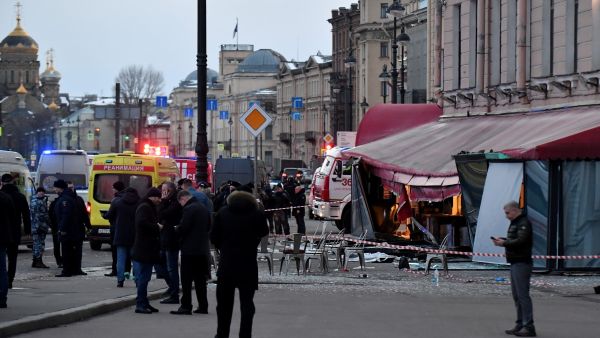 Russian police investigators inspect a damaged 'Street bar' cafe in a blast in Saint Petersburg on April 2, 2023. (Photo by Olga MALTSEVA / AFP) A military blogger killed in a cafe blast in Russia.
