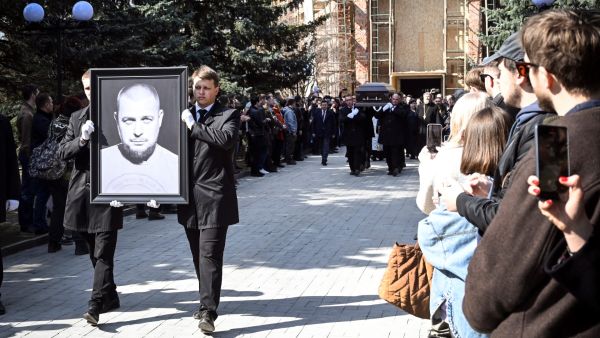 Hundreds of supporters turned out on April 8, 2023, for the funeral of a high-profile Russian military blogger killed in a bombing attack. (Photo by Alexander NEMENOV / AFP) military blogger