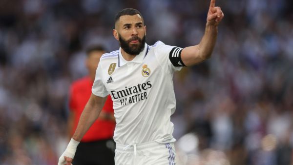 Real Madrid's French forward Karim Benzema celebrates scoring a goal during the Spanish league football match between Real Madrid CF and Real Valladolid FC at the Santiago Bernabeu stadium in Madrid on April 2, 2023. (Photo by Thomas COEX / AFP)