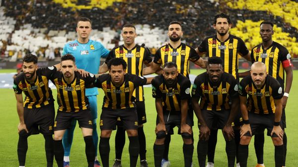 Ittihad's players take the field for the Saudi Pro League football match between al-Ittihad and al-Hilal at the King Abdullah Sports City in Jeddah on May 23, 2022. (Photo by AFP)