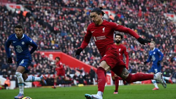 Liverpool's Uruguayan striker Darwin Nunez runs with the ball during the English Premier League football match between Liverpool and Chelsea at Anfield in Liverpool, north west England on January 21, 2023. (Photo by Paul ELLIS / AFP)