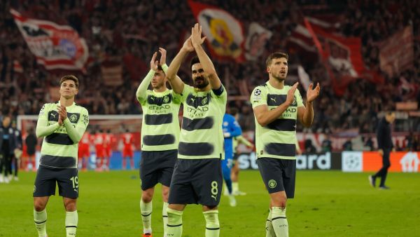 Manchester City's player including German midfielder Ilkay Gundogan (C) after the UEFA Champions League quarter-final, second leg football match between Bayern Munich and Manchester City in Munich, southern Germany on April 19, 2023. (Photo by Odd ANDERSEN / AFP)