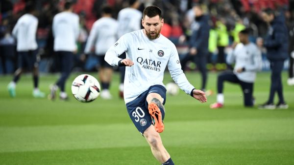 Paris Saint-Germain's Argentine forward Lionel Messi shoots during the warm up session before the French L1 football match between Paris Saint-Germain (PSG) and Olympique Lyonnais (OL) at The Parc des Princes Stadium in Paris on April 2, 2023. (Photo by STEPHANE DE SAKUTIN / AFP)