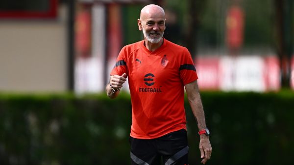 AC Milan's Italian coach Stefano Pioli supervises a training session on April 11, 2023 at the Milanello training center in Carnago, northwest of Milan, on the eve of the UEFA Champions League quarterfinal first leg football match between AC Milan and SSC Napoli. (Photo by GABRIEL BOUYS / AFP)