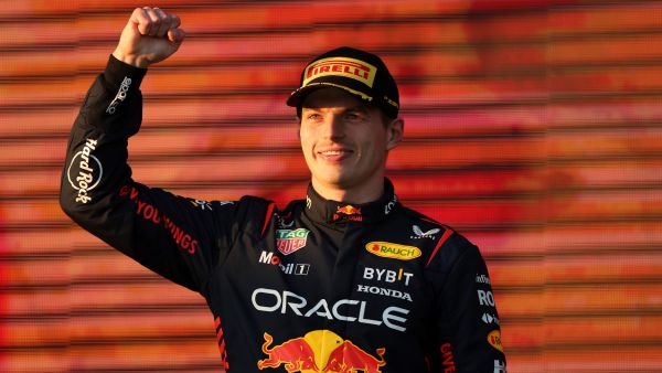 Red Bull Racing's Dutch driver Max Verstappen celebrates victory on the podium after the 2023 Formula One Australian Grand Prix at the Albert Park Circuit in Melbourne on April 2, 2023. (Photo by Martin KEEP / AFP)
