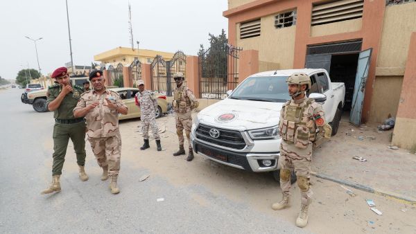 A picture taken during a media tour organised by the Libyan Ministry of Defence's media office shows members of a military unit deployed in the western city of Zawiya on May 14, 2023, following clashes between armed groups. (Photo by Mahmud TURKIA / AFP) Libya