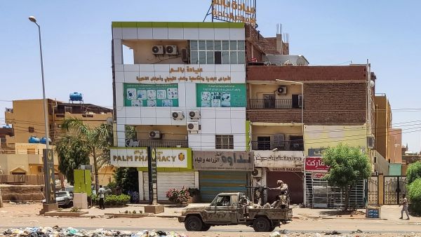 A vehicle of the paramilitary Rapid Support Forces drives down al-Sittin (sixty) road in Khartoum, on May 22, 2023, as fighting persists between two rival generals. (Photo by AFP) Sudan truce
