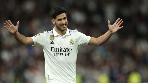 Real Madrid's Spanish midfielder Marco Asensio celebrates scoring his team's first goal during the Spanish league football match between Real Madrid CF and Getafe CF at the Santiago Bernabeu stadium in Madrid on May 13, 2023. (Photo by Thomas COEX / AFP)