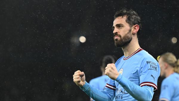 Manchester City's Portuguese midfielder Bernardo Silva celebrates after scoring their second goal during the UEFA Champions League quarter final, first leg football match between Manchester City and Bayern Munich at the Etihad Stadium in Manchester, north-west England, on April 11, 2023. (Photo by Oli SCARFF / AFP)