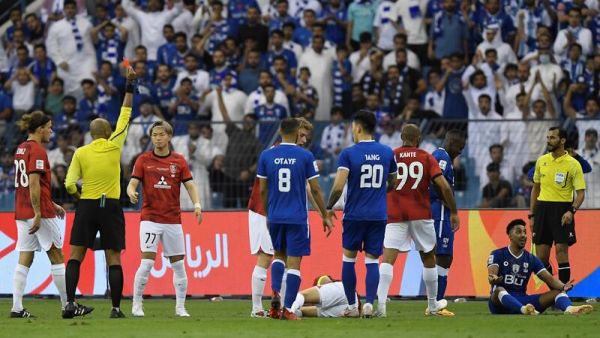 Hilal's Saudi midfielder Salem al-Dawsari (R) reacts upon receiving a red card during the first leg of AFC Champions League final between Saudi Arabia's Al-Hilal and Japan's Urawa Red Diamonds at the King Fahd International Stadium in Riyadh on April 29, 2023. (Photo by - / AFP)
