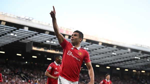 Manchester United's Brazilian midfielder Casemiro celebrates after scoring their opening goal during the English Premier League football match between Manchester United and Chelsea at Old Trafford in Manchester, north west England, on May 25, 2023. (Photo by Oli SCARFF / AFP)