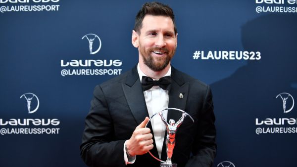 Argentinian football player Lionel Messi poses with his Laureus World Sportsman of the Year award during the 2023 Laureus World Sports Awards ceremony in Paris on May 8, 2023. (Photo by JULIEN DE ROSA / AFP)