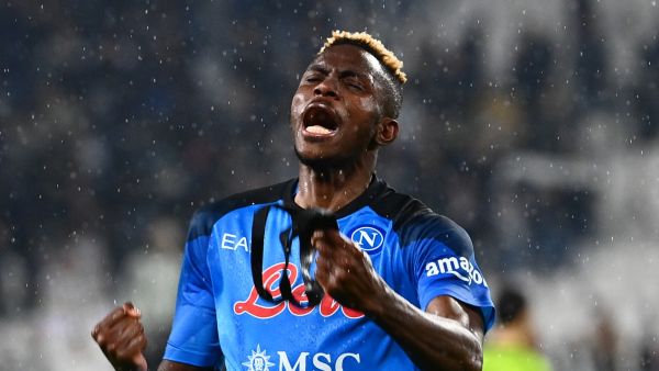Napoli's Nigerian forward Victor Osimhen celebrates after winning in the Italian Serie A football match between Juventus and Napoli on April 23, 2023 at the Juventus stadium in Turin. (Photo by Isabella BONOTTO / AFP)