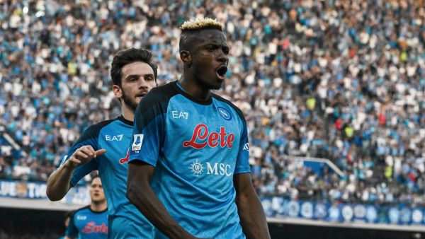 Napoli's Nigerian forward Victor Osimhen celebrates after scoring a penalty to open the scoring during the Italian Serie A football match between SSC Napoli and Fiorentina on May 7, 2023 at the Diego-Maradona stadium in Naples. Napoli makes their first appearance in front of their home fans on May 7 since becoming Italian champions for the first time since 1990 when they host Fiorentina. (Photo by Tiziana FABI / AFP)