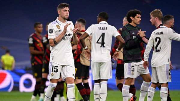 Real Madrid's Uruguayan midfielder Federico Valverde applauds at the end of the UEFA Champions League semi-final first leg football match between Real Madrid CF and Manchester City at the Santiago Bernabeu stadium in Madrid on May 9, 2023. (Photo by JAVIER SORIANO / AFP)