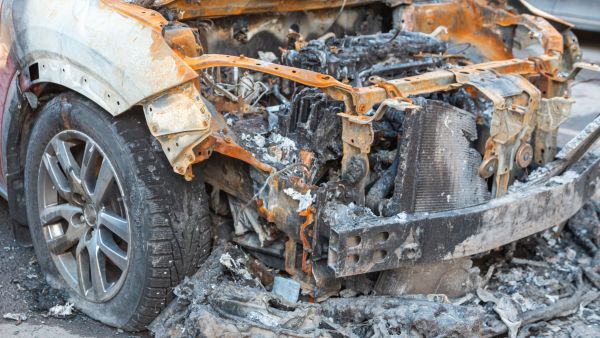 Abandoned burnt-out car after the explosion, ready for scrapping. The burnt-out interior of the car, a close-up of the fire, extinguishing the fire. A burnt-out car, due to a short circuit, arson. Shutterstock image. Car blast at police station rattles Syrian capital