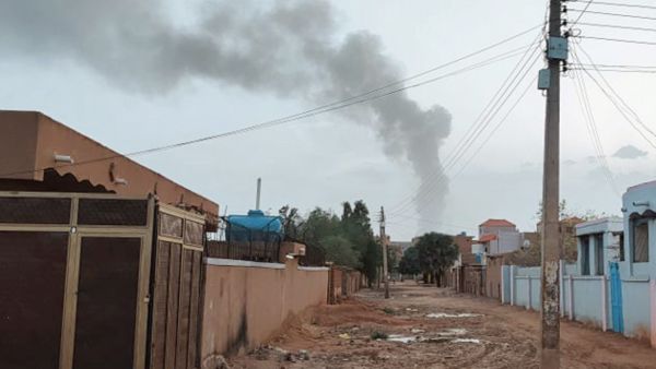 Smoke billows in the distance amid ongoing fighting in Khartoum on June 13, 2023. (Photo by AFP) Sudan