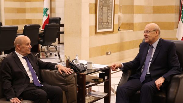 Lebanese caretaker Prime Minister Najib Mikati (R) meets with France's new special envoy for Lebanon Jean-Yves Le Drian, in Beirut on June 22, 2023. (Photo by ANWAR AMRO / AFP) France's new special envoy for Lebanon Jean-Yves Le Drian