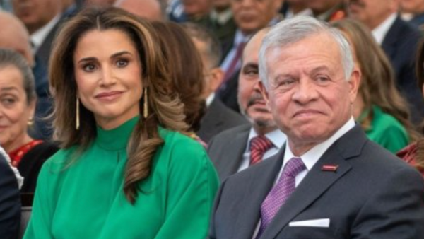 King Abdullah II and Queen Rania arrive at Zahran Palace.