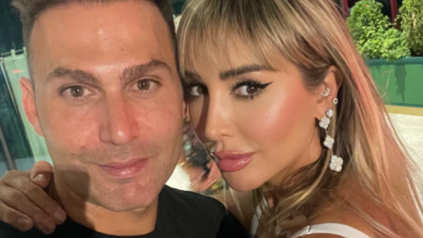 Joelle gives her husband sweet kiss on the lips