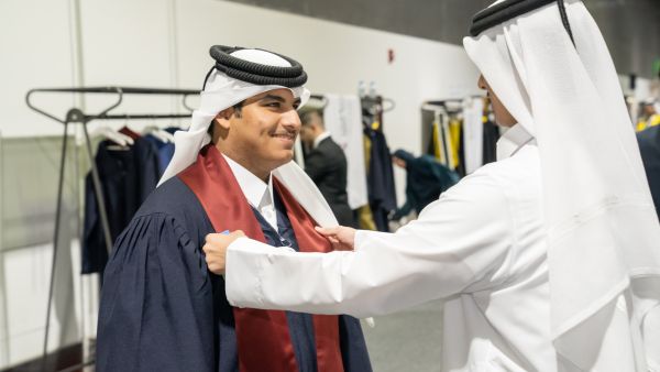 Students run first unified commencement ceremony. QF student volunteers demonstrate value of learning beyond the classroom