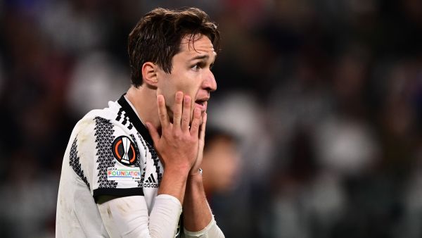 Juventus' Italian forward Federico Chiesa reacts after missing a goal opportunity during the UEFA Europa League semi-final first leg football match between Juventus and Sevilla on May 11, 2023 at the Juventus stadium in Turin. (Photo by Marco BERTORELLO / AFP)