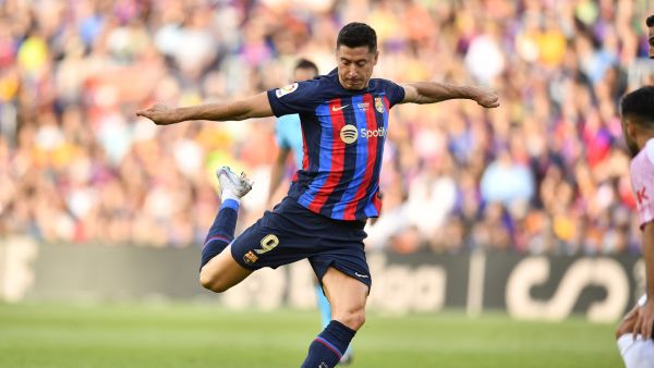 Barcelona's Polish forward Robert Lewandowski kicks the ball during the Spanish league football match between FC Barcelona and RCD Mallorca at the Camp Nou stadium in Barcelona on May 28, 2023. (Photo by Pau BARRENA / AFP)