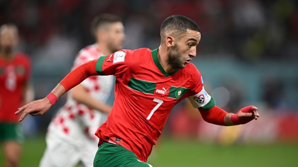 Morocco's midfielder #07 Hakim Ziyech runs during the Qatar 2022 World Cup third place play-off football match between Croatia and Morocco at Khalifa International Stadium in Doha on December 17, 2022. (Photo by Paul ELLIS / AFP)