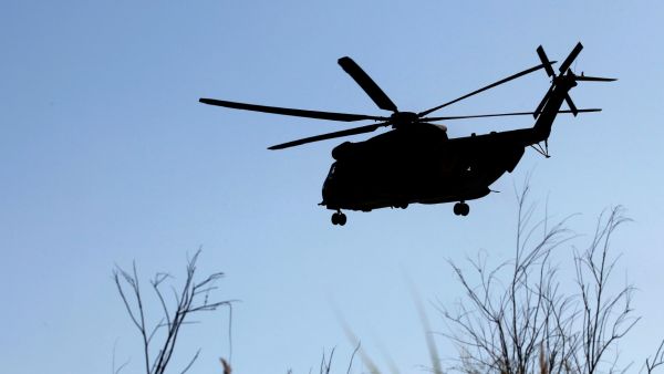 A Sikorsky CH-53K King Stallion helps searching the Sea of Galilee coasts for remains of a reported drone launched from Syria and intercepted by a Patriot missile on July 11, 2018. (Photo by JALAA MAREY / AFP) reconnaissance plane