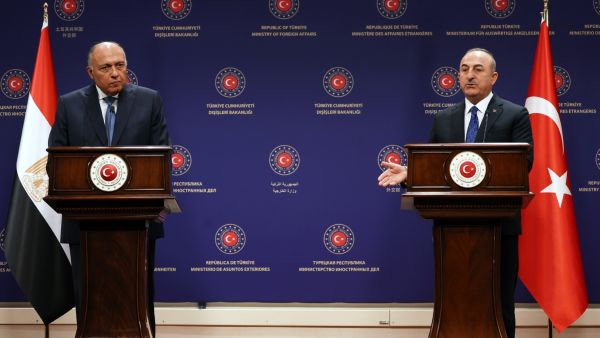 Turkish Foreign Affairs Minister Mevlut Cavusoglu (R) and Egyptian Foreign Affairs Minister Sameh Shoukry hold a joint news conference in Ankara on April 13, 2023. (Photo by Adem ALTAN / AFP) Egypt, Turkey
