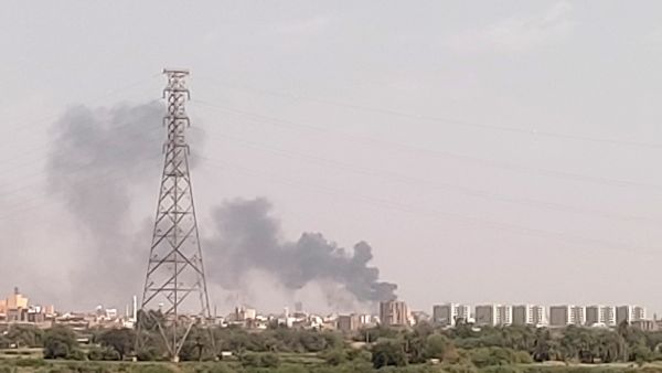 A picture taken from Omdurman shows smoke billowing north of Khartoum on July 22, 2023. (Photo by AFP) Sudan