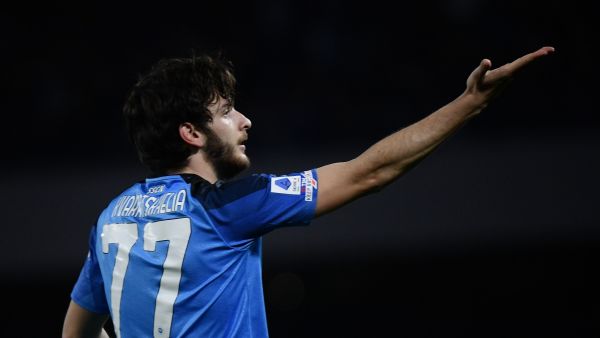 Napoli's Georgian forward Khvicha Kvaratskhelia celebrates after opening the scoring during the Italian Serie A football match between Napoli and Atalanta on March 11, 2023 at the Diego-Maradona stadium in Naples. (Photo by Filippo MONTEFORTE / AFP)