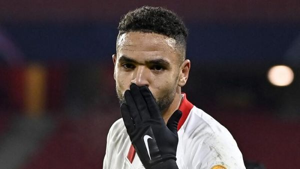 Sevilla's Moroccan forward Youssef En-Nesyri celebrates after scoring a goal during the UEFA Champions League Group E football match between Stade Rennais FC and Seville FC, at the Roahzon park stadium in Rennes, western France, on December 8, 2020. (Photo by DAMIEN MEYER / AFP)