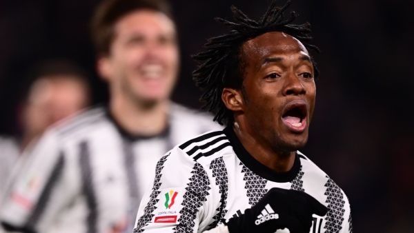 Juventus' midfielder Juan Cuadrado from Colombia celebrates after scoring a goal during the Italian Cup semi-final first leg football match between Juventus and Inter Milan on April 4 2023 at the "Allianz Stadium" in Turin. (Photo by Marco BERTORELLO / AFP)