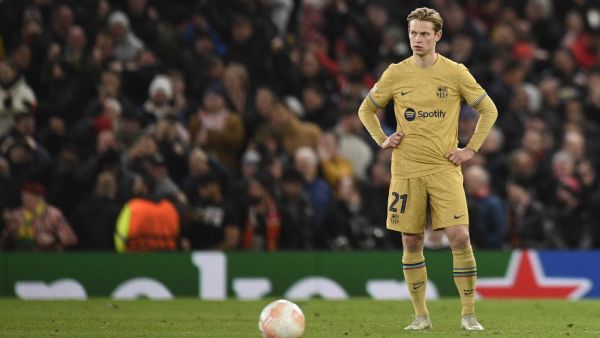 Barcelona's Dutch midfielder Frenkie de Jong reacts during the UEFA Europa league knockout round play-off second leg football match between Manchester United and FC Barcelona at Old Trafford stadium in Manchester, north west England, on February 23, 2023. (Photo by Oli SCARFF / AFP)