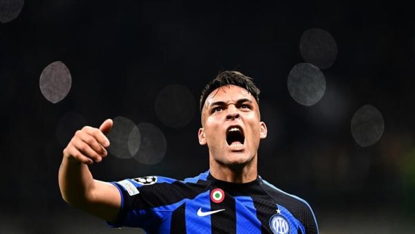 Inter Milan's Argentinian forward Lautaro Martinez celebrates after scoring his side's second goal during the UEFA Champions League quarter-finals second leg football match between Inter Milan and Benfica Lisbon on April 19, 2023 at the Giuseppe-Meazza (San Siro) stadium in Milan. (Photo by GABRIEL BOUYS / AFP)