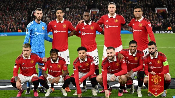 Manchester United's players pose for team photo during the UEFA Europa league knockout round play-off second leg football match between Manchester United and FC Barcelona at Old Trafford stadium in Manchester, north west England, on February 23, 2023. (Photo by Oli SCARFF / AFP)