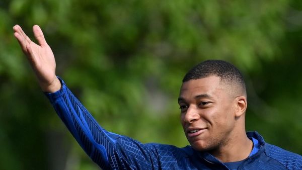 France's forward Kylian Mbappe gestures before a training session ahead of the upcoming UEFA Euro 2024 football tournament qualifying matches in Clairefontaine-en-Yvelines, on June 12, 2023. France will play against Gibraltar on June 16, 2023 and against Greece on June 19, 2023 in their UEFA Euro 2024 Group B Qualification matches. (Photo by FRANCK FIFE / AFP)