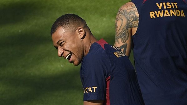 Paris Saint-Germain's French forward Kylian Mbappe reacts as he takes part in a training session at the new "campus" of French L1 Paris Saint-Germain (PSG) football club at Poissy, some 30kms west of Paris on July 20, 2023, ahead of the club's Japan tour. (Photo by JULIEN DE ROSA / AFP)