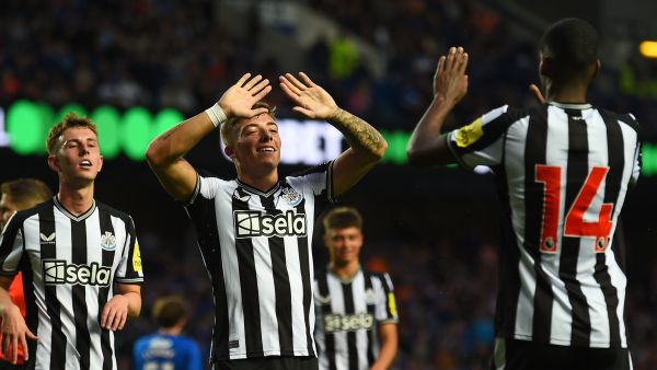 Newcastle United's Scottish defender Harrison Ashby (C) celebrates after scoring their second goal during the pre-season friendly football match between Rangers and Newcastle United at the Ibrox Stadium, in Glasgow, on July 18, 2023. (Photo by ANDY BUCHANAN / AFP)