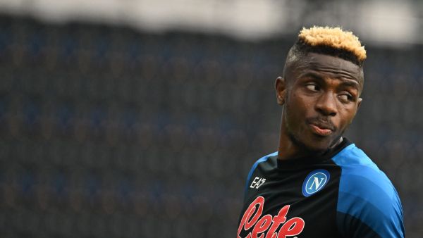 Napoli's Nigerian forward Victor Osimhen warms up prior to the Italian Serie A football match between Napoli and Sampdoria on June 4, 2023 at the Diego-Maradona stadium in Naples. (Photo by Tiziana FABI / AFP)